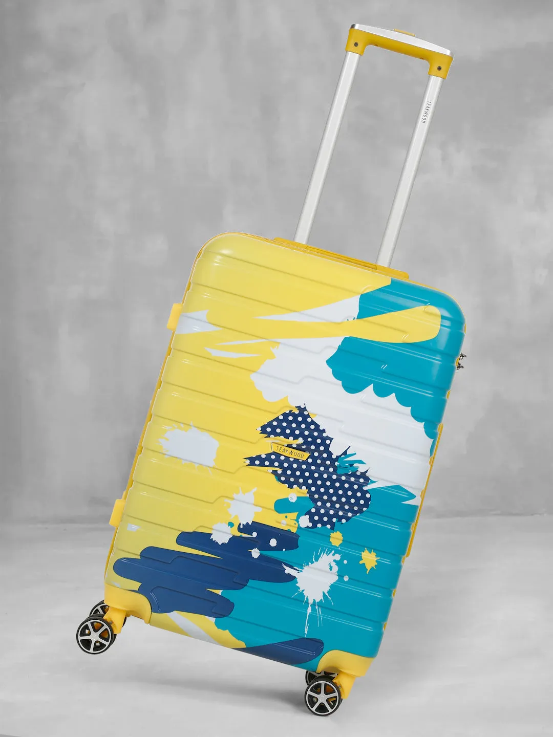 Yellow Abstract printed hard sided trolley bag